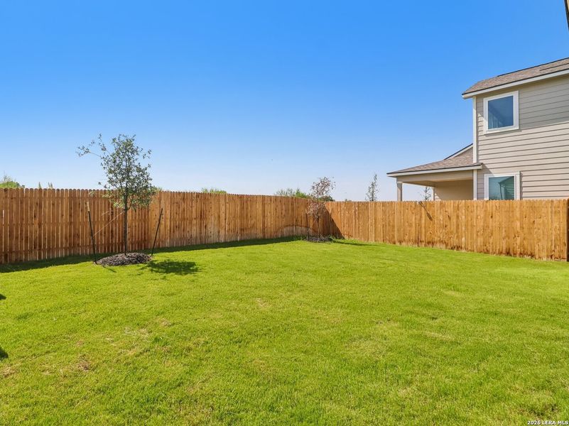 Exterior details and patio area of a home in Fairway Crossing, Converse (Image 3).