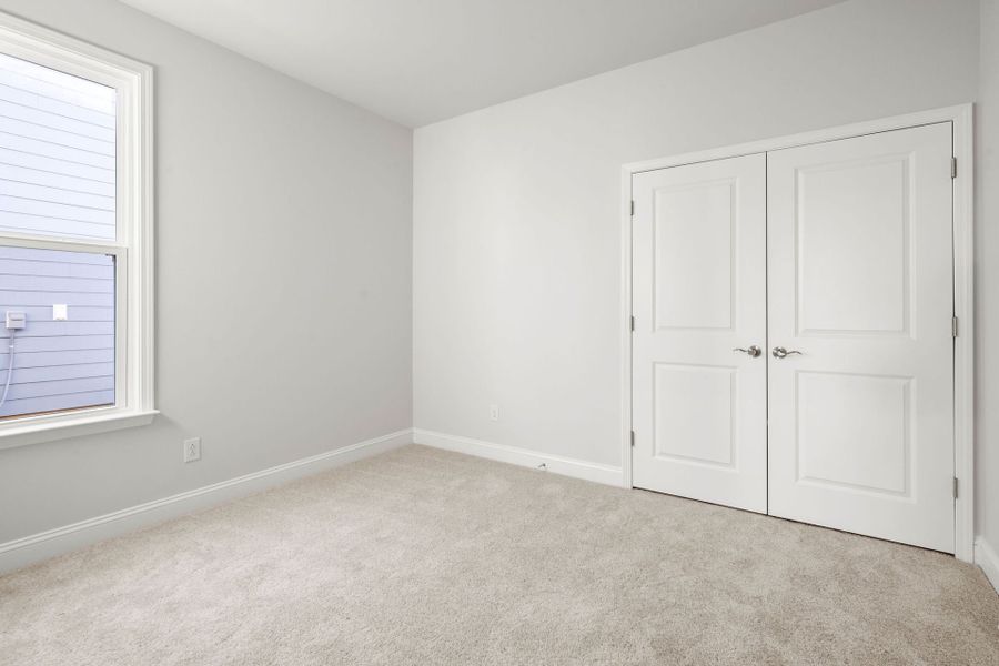 Spacious, unfurnished interior of a new home in Midpoint at New Riverside, Bluffton (Image 26).