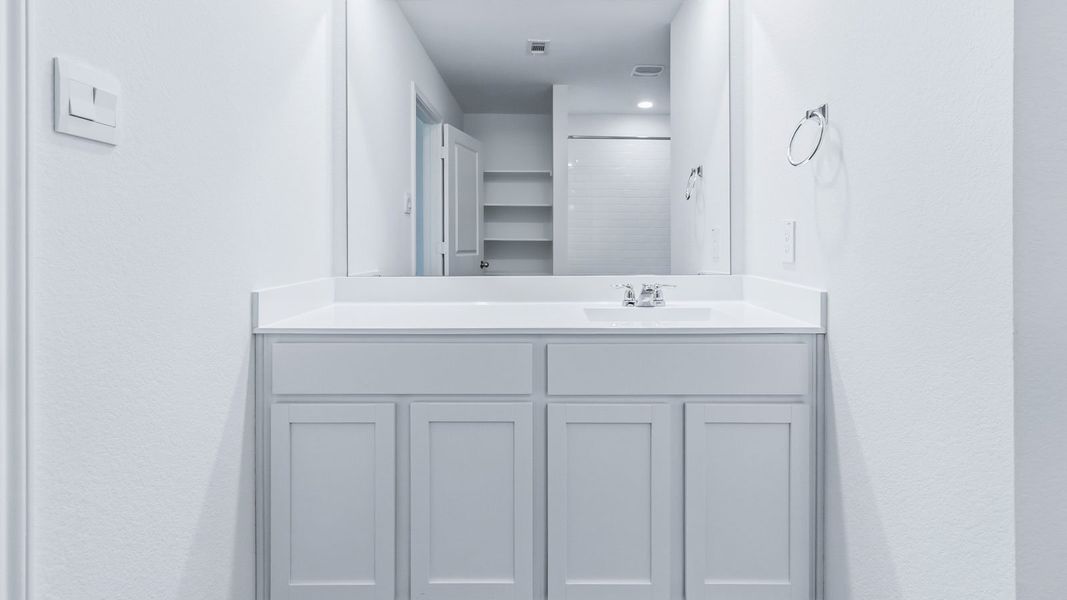 Representative furnished interior of a home built from the The Easton by D.R. Horton in Wayside, Uhland (Image 13).