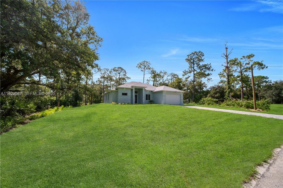 Exterior details and patio area of a home in , Lehigh Acres (Image 30). Exterior details and patio area of a home in , Lehigh Acres (Image 30).