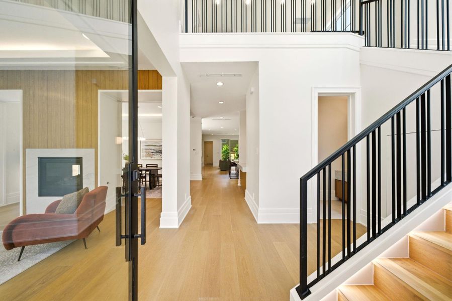 Welcoming front entry highlights beautiful white oak flooring throughout. Welcoming front entry highlights beautiful white oak flooring throughout.