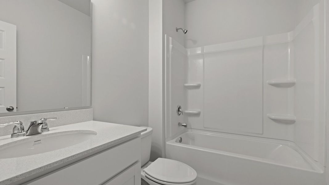 Representative furnished interior of a home built from the HALTON by D.R. Horton in Sheep Island, Summerville (Image 10).