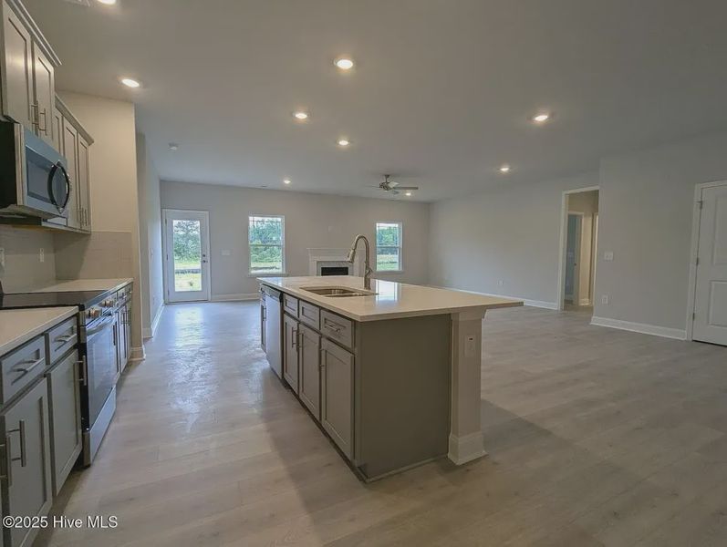 Furnished interior view inside a new home in Hidden Lake Estates, Greenville (Image 6).