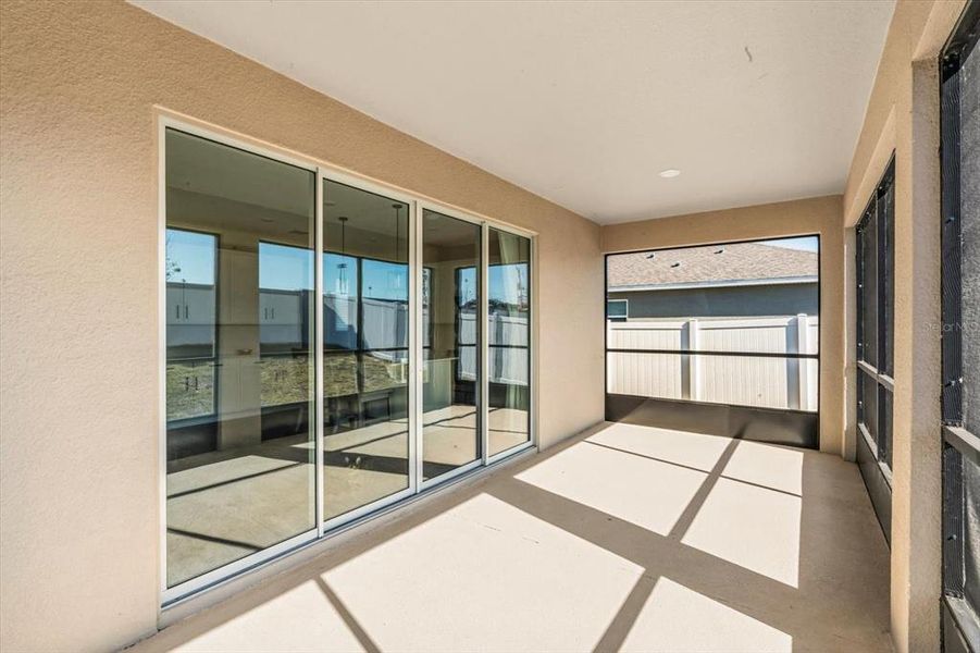 Exterior details and patio area of a home in Seasons at Lakeside Forest, Tavares (Image 3).