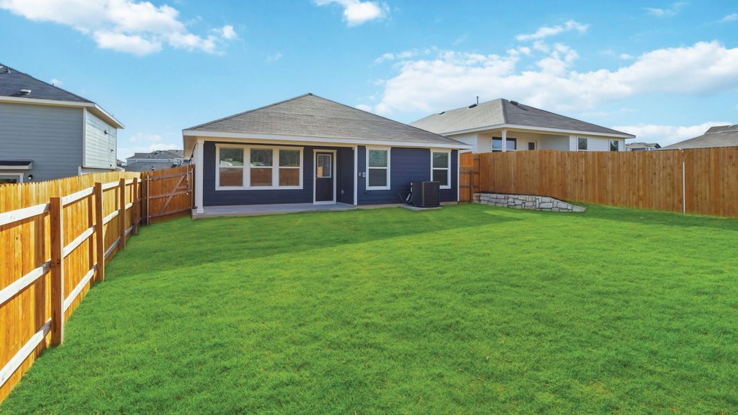Exterior details and patio area of a home in Wayside, Uhland (Image 4).