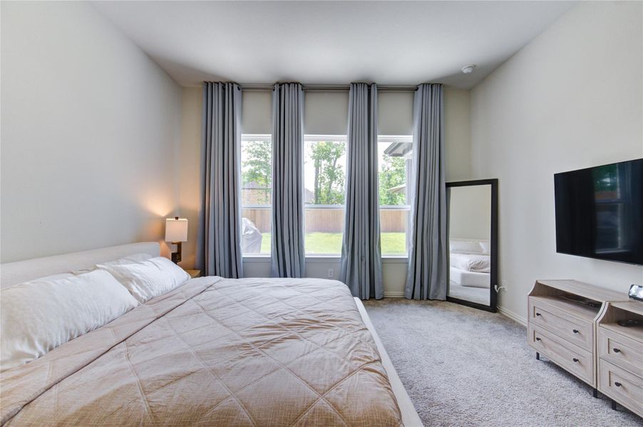 Primary Suite to relax and rejuvenate.