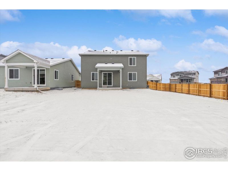 Exterior details and patio area of a home in The Overlook at Johnstown Farms, Johnstown (Image 3).