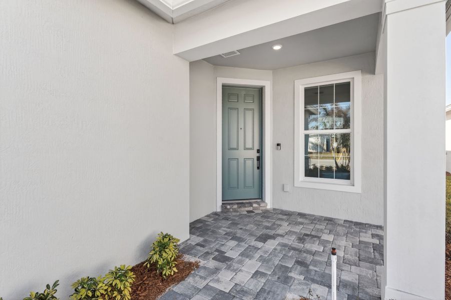 Exterior details and patio area of a home in Costa Pointe, Vero Beach (Image 28).