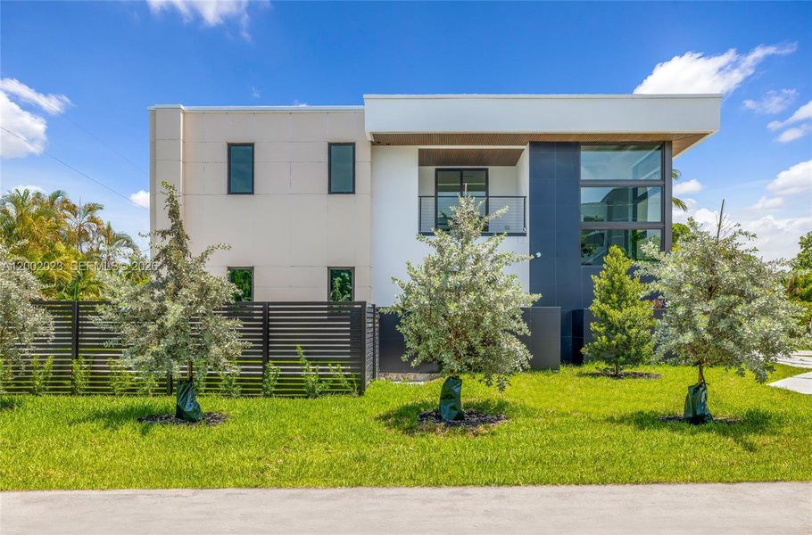 Front exterior of a new home in , Fort Lauderdale, FL, highlighting curb appeal (Image 26).