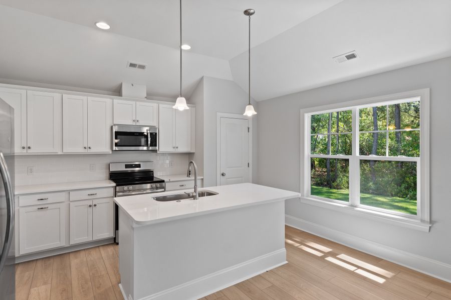 Representative furnished interior of a home built from the Sand Dune by Bill Clark Homes in Osprey Landing, Southport (Image 5).