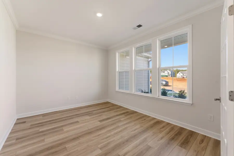 Spacious, unfurnished interior of a new home in Cottages at Lake Emory, Inman (Image 17).