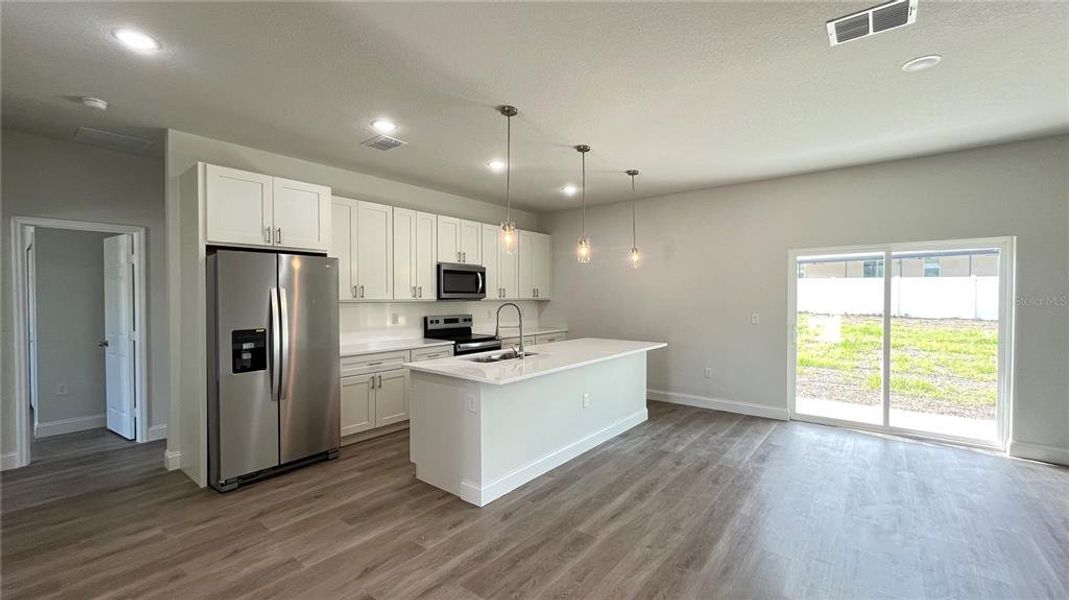 Kitchen and family room view.