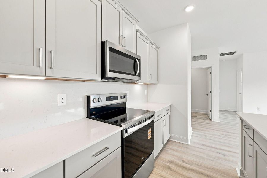 Furnished interior view inside a new home in The Cottages at 78 North, Sanford (Image 14).