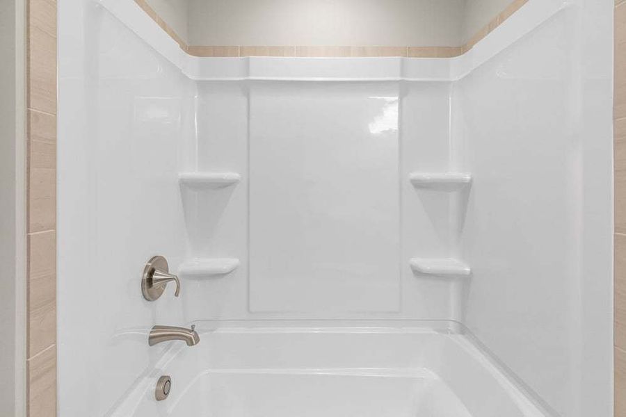 Representative furnished interior of a home built from the Magnolia by Caviness & Cates Communities in Bartlett Manor, Youngsville (Image 53).