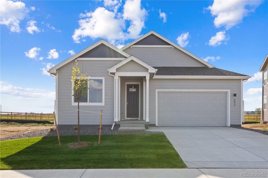 Front exterior of a new home in Granary, Johnstown, CO, highlighting curb appeal (Image 2). Front exterior of a new home in Granary, Johnstown, CO, highlighting curb appeal (Image 2).