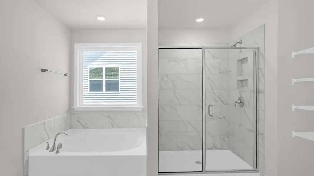 Furnished interior view inside a new home in The Estates Park, Apex (Image 12).