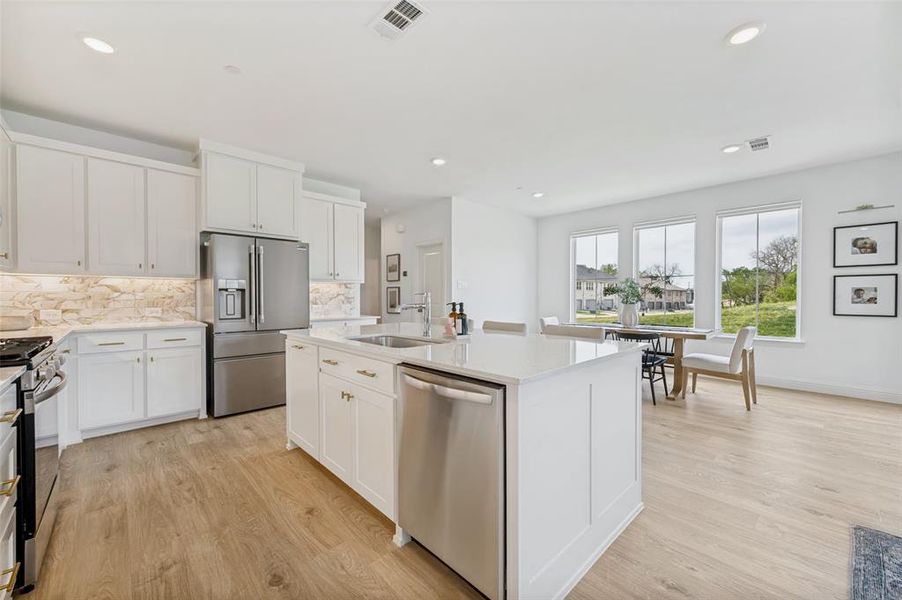 Furnished interior view inside a new home in Painted Tree - Woodland District, McKinney (Image 13).