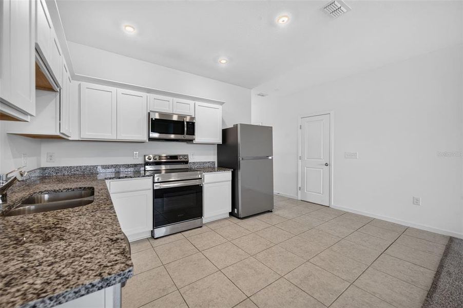 Furnished interior view inside a new home in , St. Cloud (Image 9).