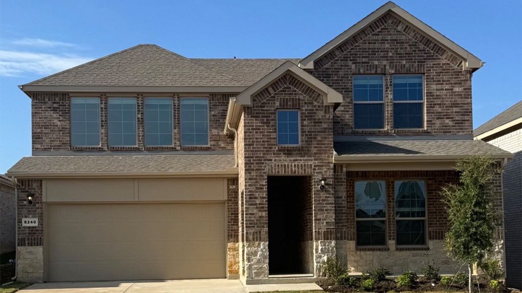Representative exterior photo of a completed home built from the Ozark by D.R. Horton in Augusta Square, Fort Worth, TX (Image 19).