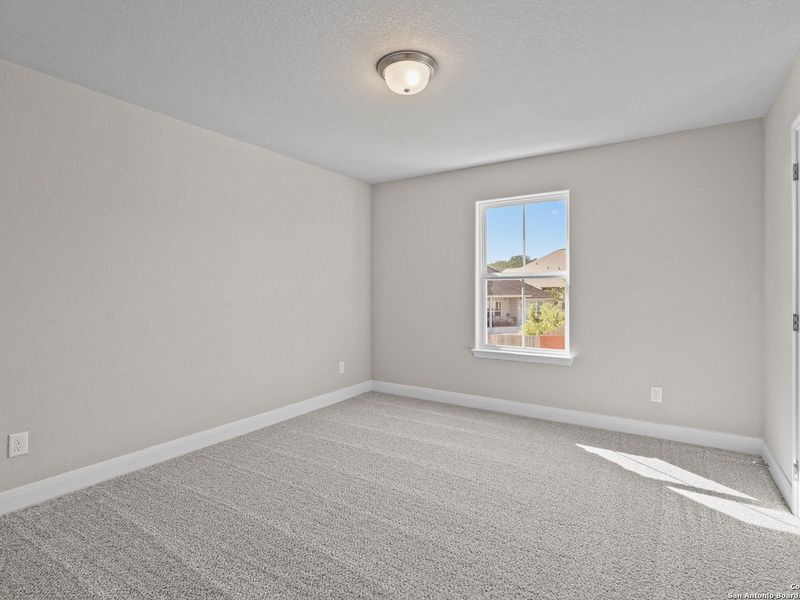 Spacious, unfurnished interior of a new home in The Reserve at Potranco Oaks, Castroville (Image 38).