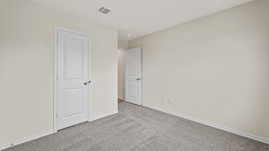 Spacious, unfurnished interior of a new home in Stonewyck Farms, Ennis (Image 34).