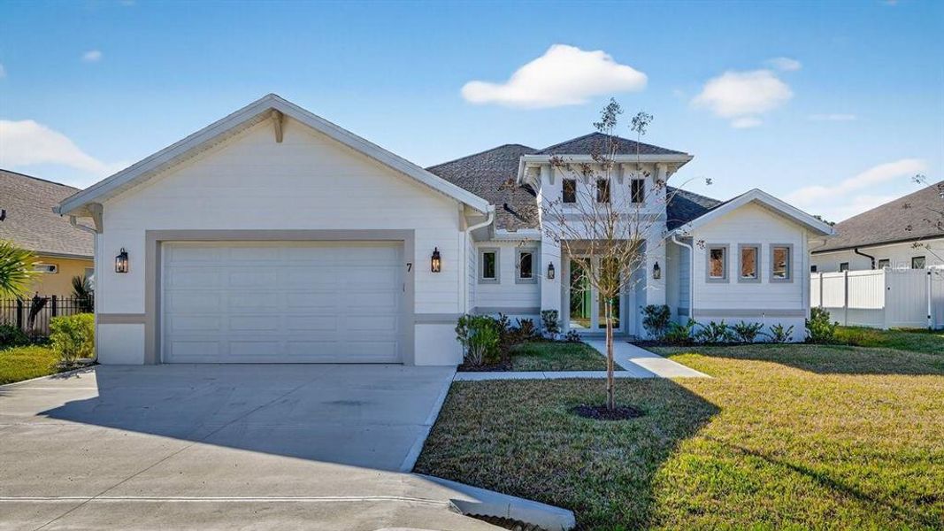 Front exterior of a new home in , Palm Coast, FL, highlighting curb appeal (Image 29).