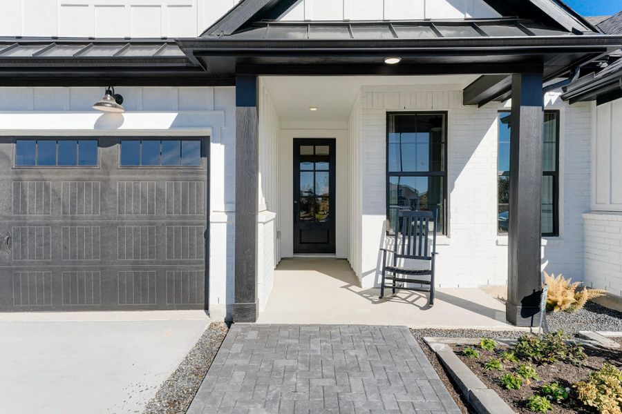 Front exterior of a new home in Bridgeland: Signature Collection, Cypress, TX, highlighting curb appeal (Image 2).