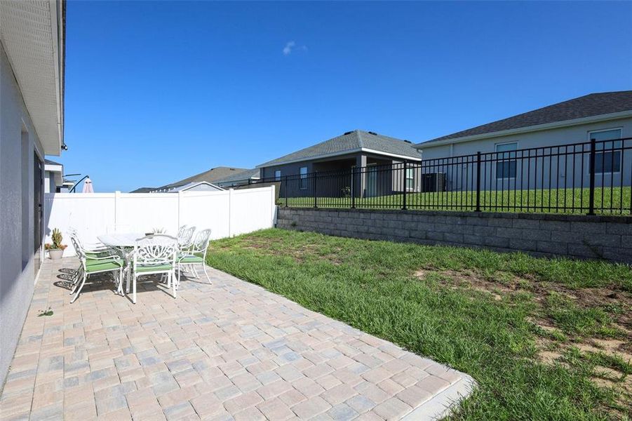 Exterior details and patio area of a home in Geneva Landings, Davenport (Image 21). Exterior details and patio area of a home in Geneva Landings, Davenport (Image 21).