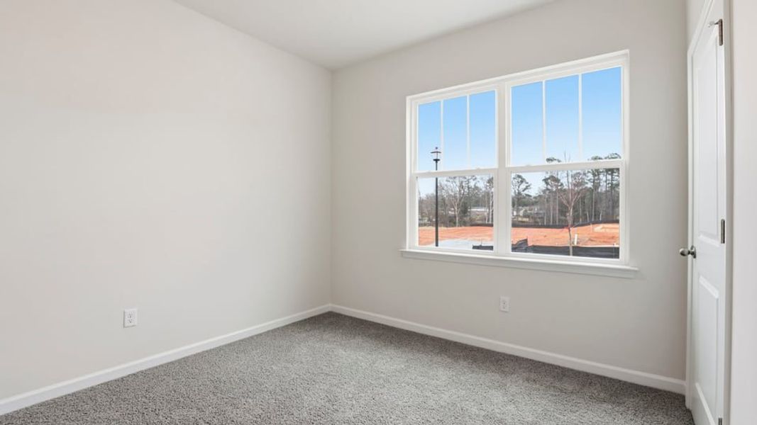 Spacious, unfurnished interior of a new home in Waverly Station, Greenwood (Image 11).