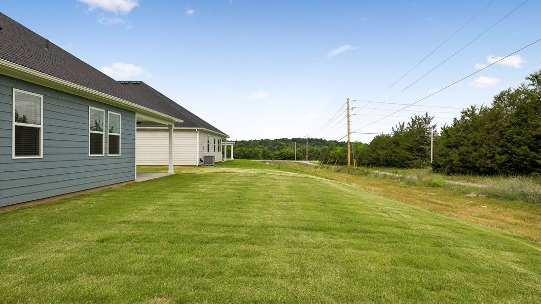 Exterior details and patio area of a home in Reserve at Hickory Ridge, Columbia (Image 31).