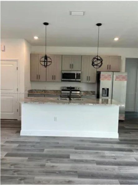 Furnished interior view inside a new home in , Poinciana (Image 6). Furnished interior view inside a new home in , Poinciana (Image 6).