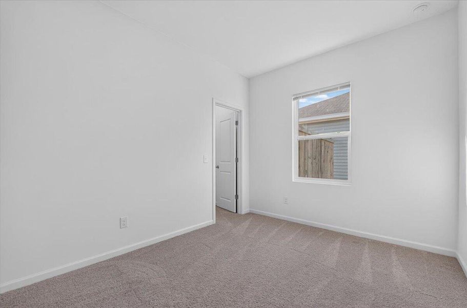 Spacious, unfurnished interior of a new home in Pender Woods at Cane Bay, Summerville (Image 29).