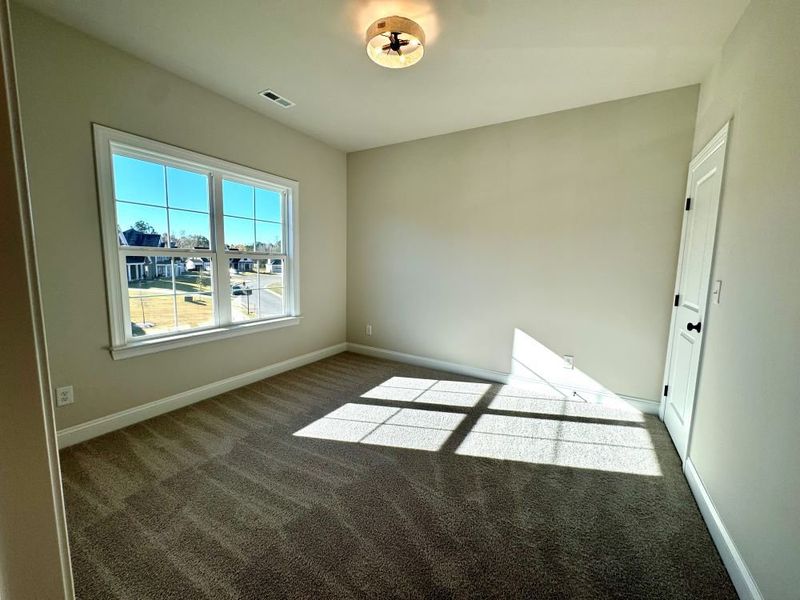 2 story home with a first floor main bedroom