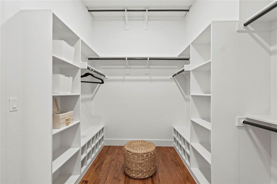 Walk in closet with wood finished floors Walk in closet with wood finished floors