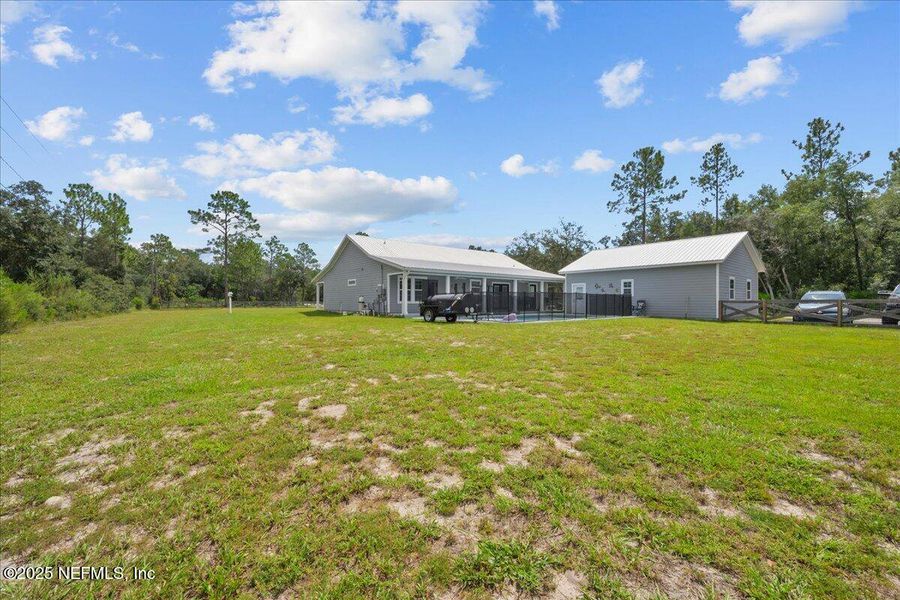 Front exterior of a new home in , Palatka, FL, highlighting curb appeal (Image 1).
