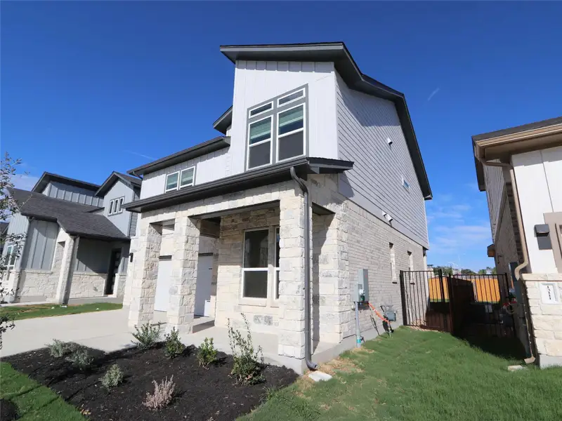 Exterior details and patio area of a home in Estancia West, Manchaca (Image 4).