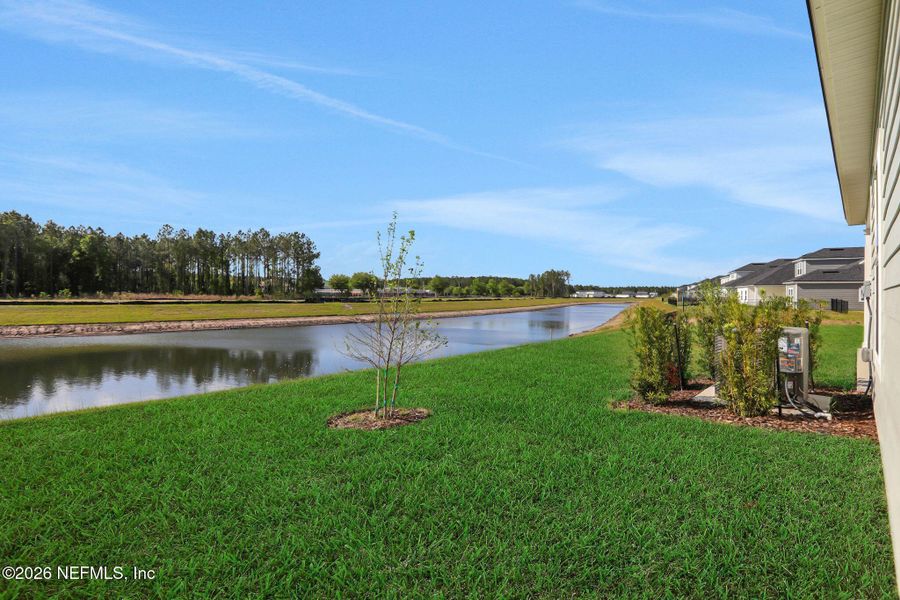 Exterior details and patio area of a home in Amberly, Green Cove Springs (Image 4).