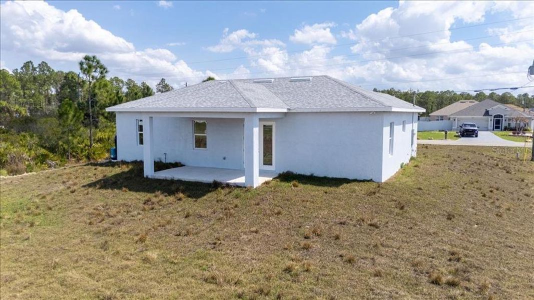 Exterior details and patio area of a home in , Lehigh Acres (Image 3). Exterior details and patio area of a home in , Lehigh Acres (Image 3).