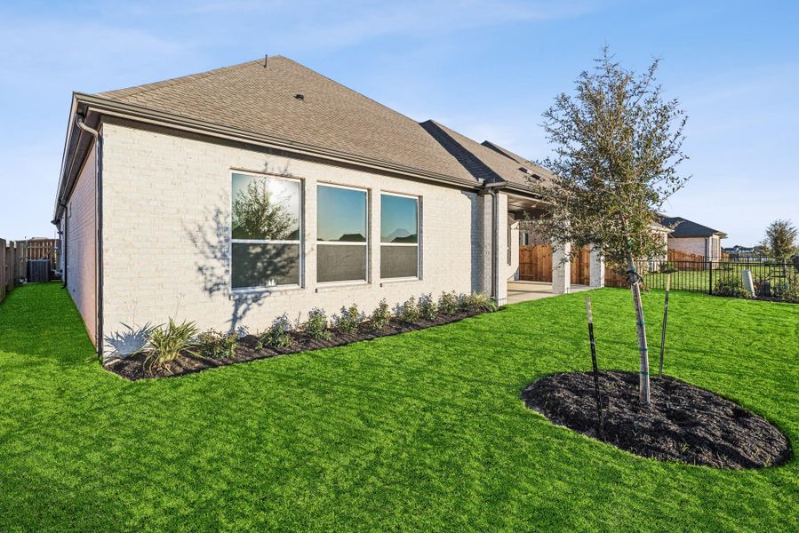 Exterior details and patio area of a home in Oakwood Estates, Waller (Image 4). Exterior details and patio area of a home in Oakwood Estates, Waller (Image 4).