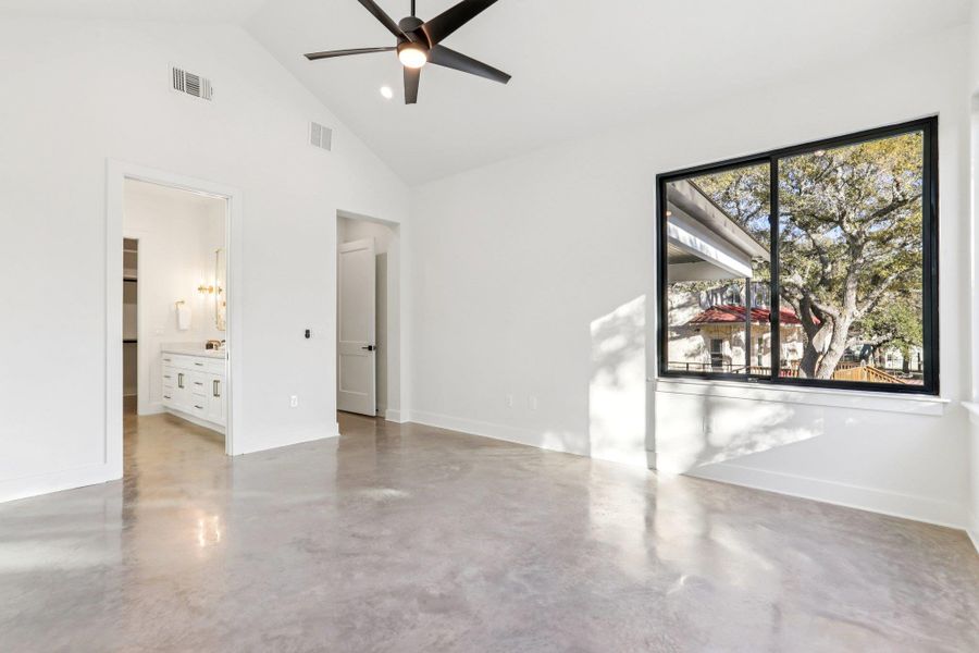 Enjoy the convenience of ground-floor living in this expansive bedroom suite. Ideally positioned away from the upstairs activity, it offers easy access to a full bath and the rear yard