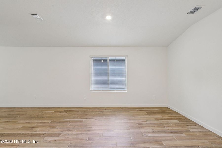 Spacious, unfurnished interior of a new home in Colbert Landings, Palm Coast (Image 17).