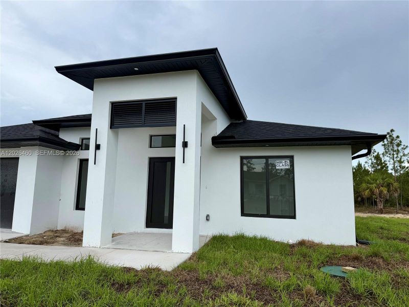 Exterior details and patio area of a home in , Lehigh Acres (Image 38).