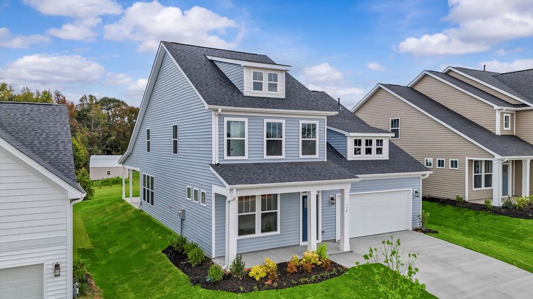 First-rate curb appeal with clean lines and a welcoming front entry First-rate curb appeal with clean lines and a welcoming front entry