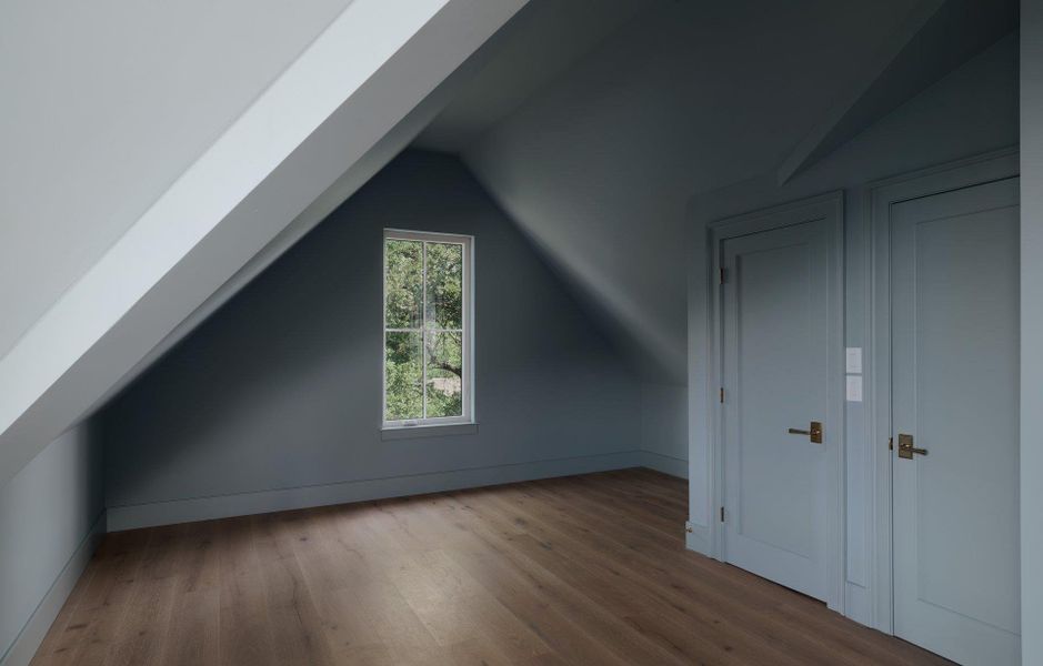 Third floor has a closet and full bath and is included in the bed count.  Could also be a home office.