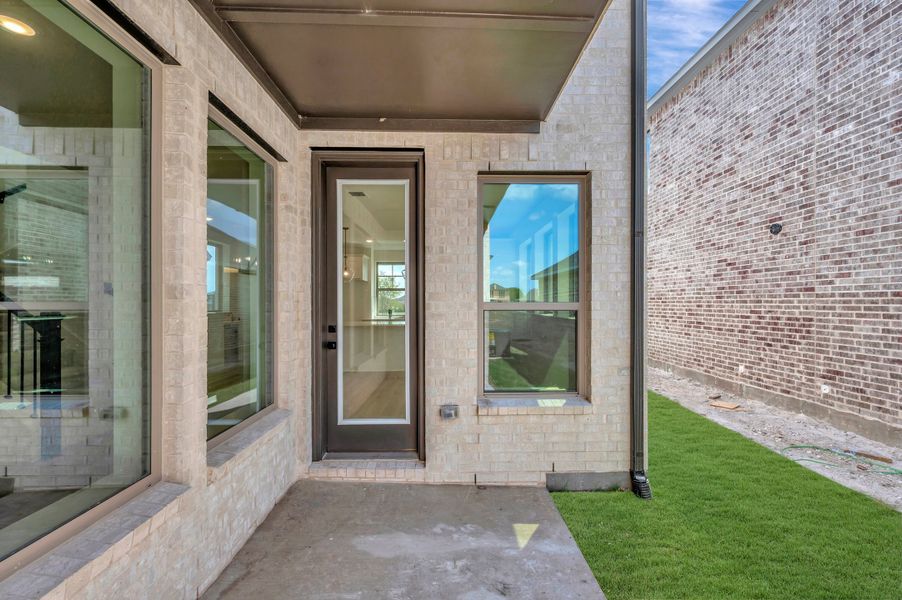 Exterior details and patio area of a home in Solterra - Cottage Series, Mesquite (Image 4).