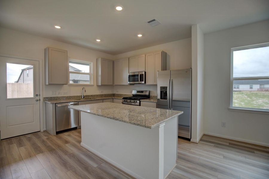 Furnished interior view inside a new home in Mason Woods, Cypress (Image 5).