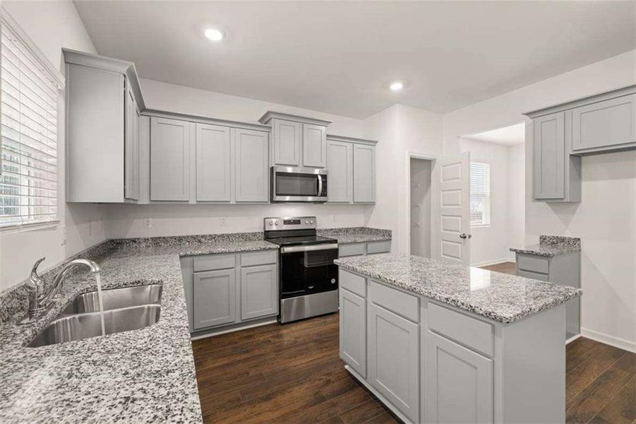 Furnished interior view inside a new home in Oakchase at Hampton, Hampton (Image 4).