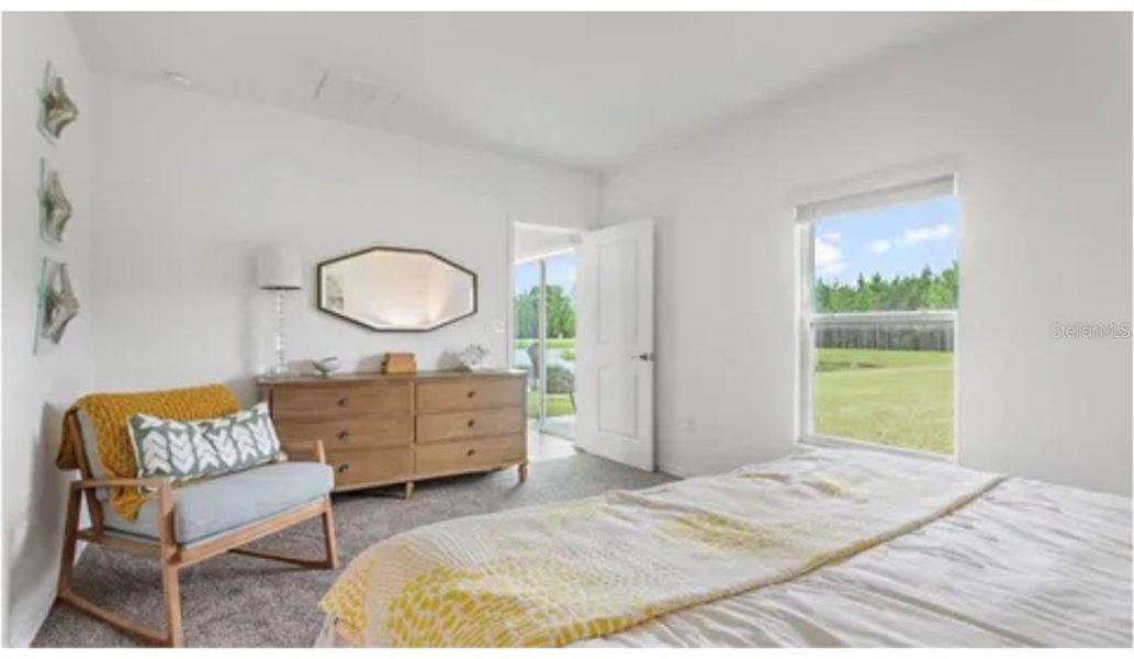 Furnished interior view inside a new home in Cascades: Legacy Collection, Davenport (Image 8).