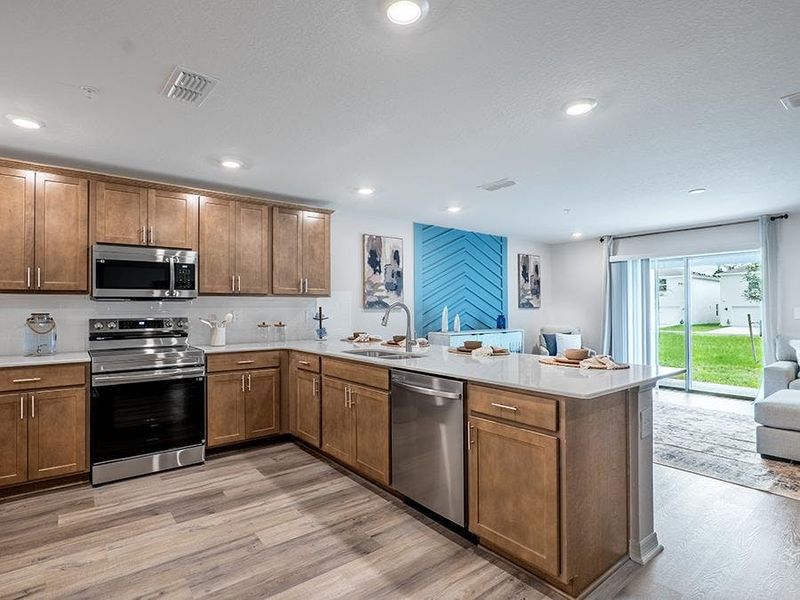 Choose from homes with warm wood or classic white finishes - Azalea townhome by Highland Homes