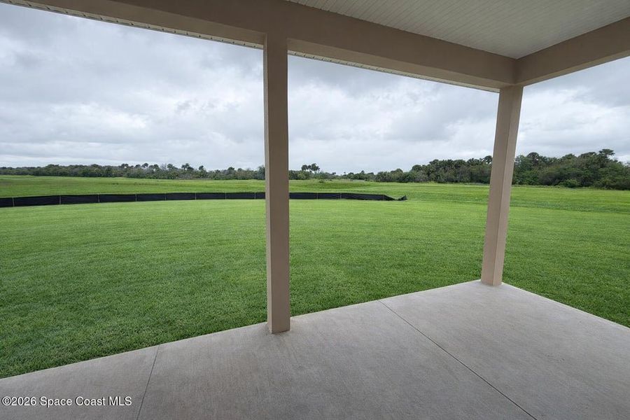 Exterior details and patio area of a home in St. John's Preserve, Palm Bay (Image 18).